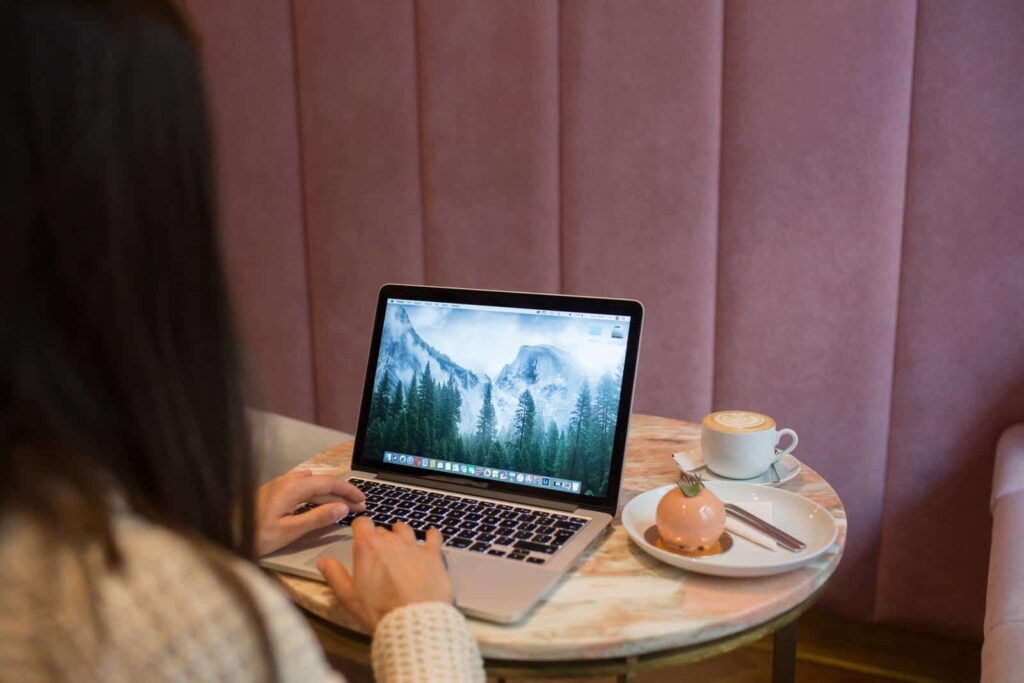 woman using MacBook